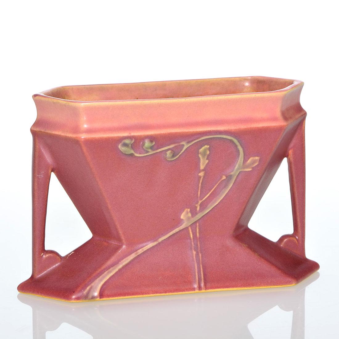 Roseville Futura 2-Pole Pink vase, shape 85-4, 4 1/8: Roseville Futura 2-Pole Pink vase, shape 85-4. Unmarked. There is faint overall crazing. Height is 4 1/8 inches.