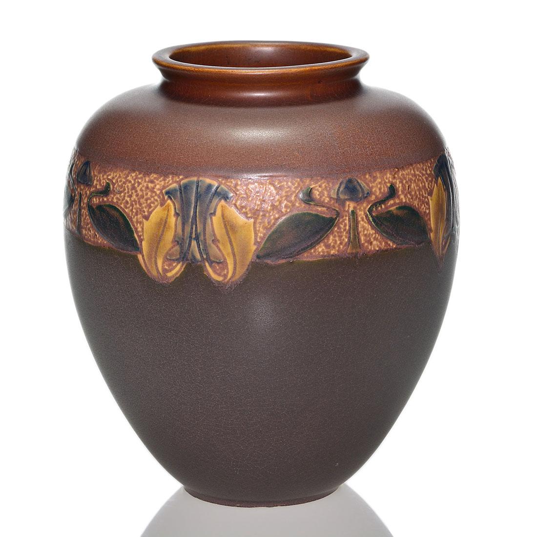 Roseville Victorian Art vase, brown, 8 inches: Roseville Victorian Art vase with a floral band at the shoulder and done in various mat glazes. Unmarked. There is fine overall crazing. Height is 8 inches.