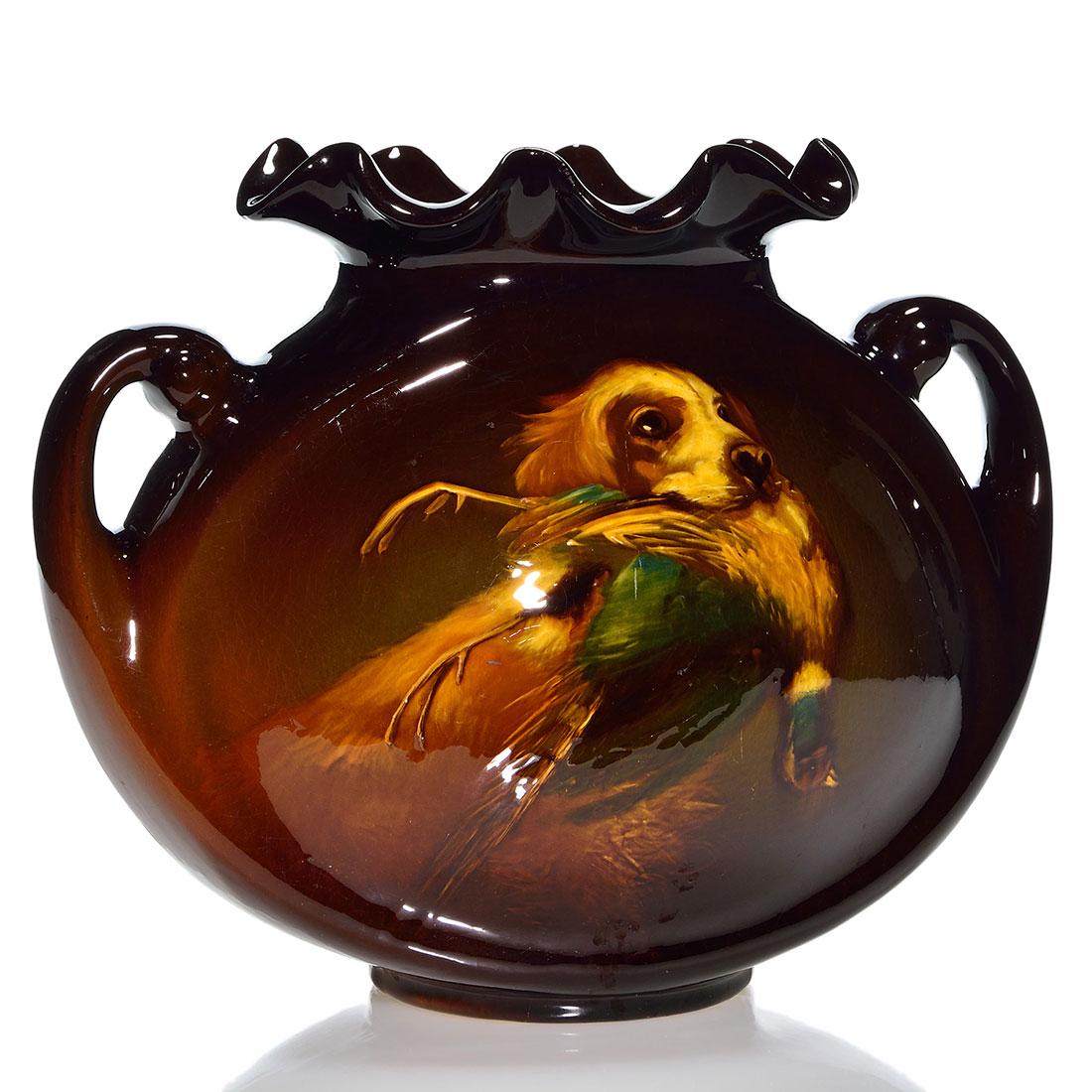 Roseville Rozane Royal pillow vase,dog,Timberlake,9 1/4: Rozane Royal Dark pillow vase with the image of a retriever holding a pheasant in its mouth, the work of Mae Timberlake. Marked with a Rozane Ware Royal wafer seal and signed M. Timberlake in slip on 