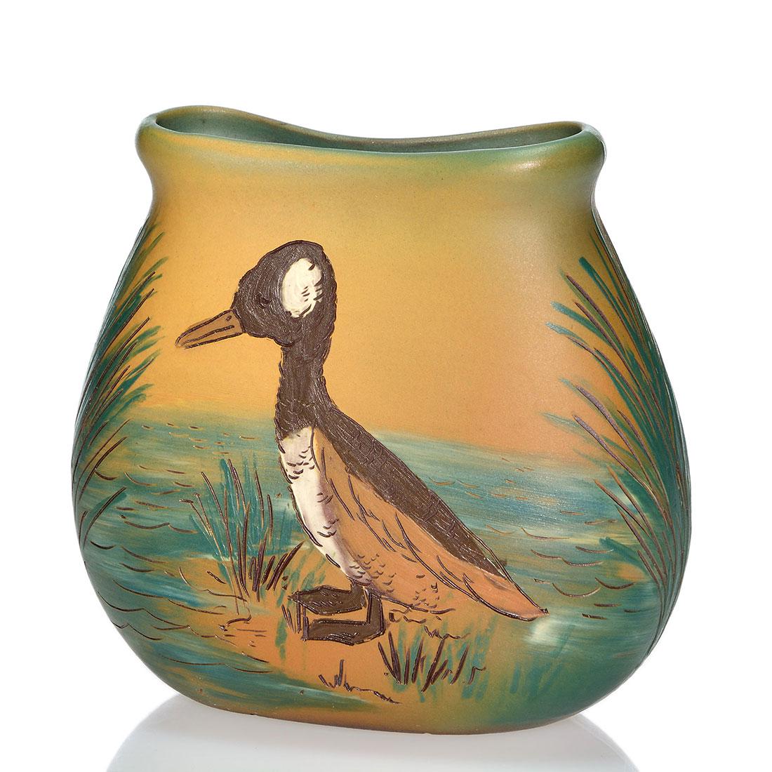 Weller Dickens Ware II vase, duck, 5 1/8”: Weller Second Line Dickens Ware vase decorated with a duck standing alongside a stream. Impressed Dickens Ware Weller and X 352. Excellent original condition. Height is 5 1/8 inches.
