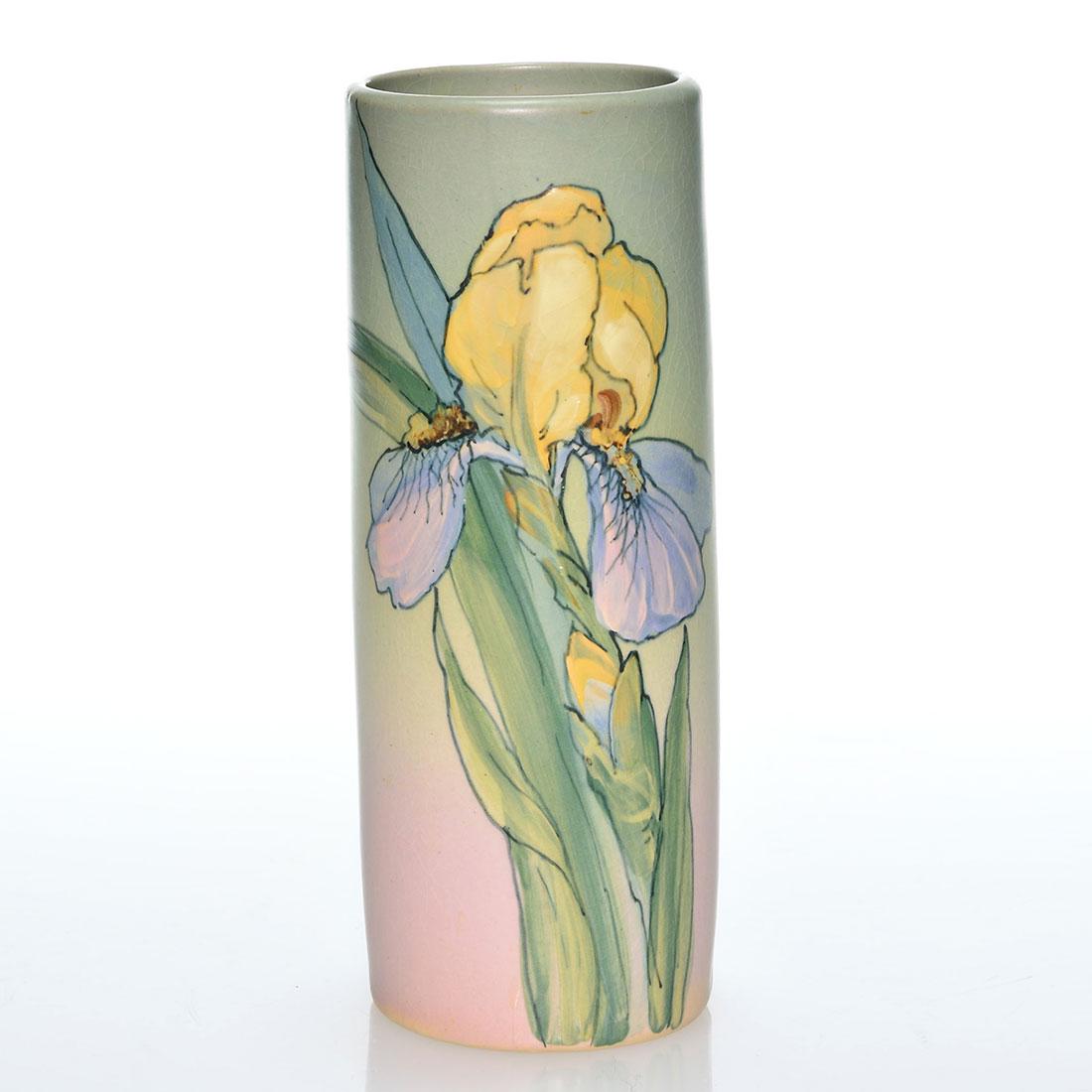 weller Hudson vase, irises, England, 8 3/8”: Weller Hudson vase decorated with irises painted by Dorothy England who added her signature in black slip near the base. Marked with the Weller Ware half kiln ink stamp. There is faint overall crazing