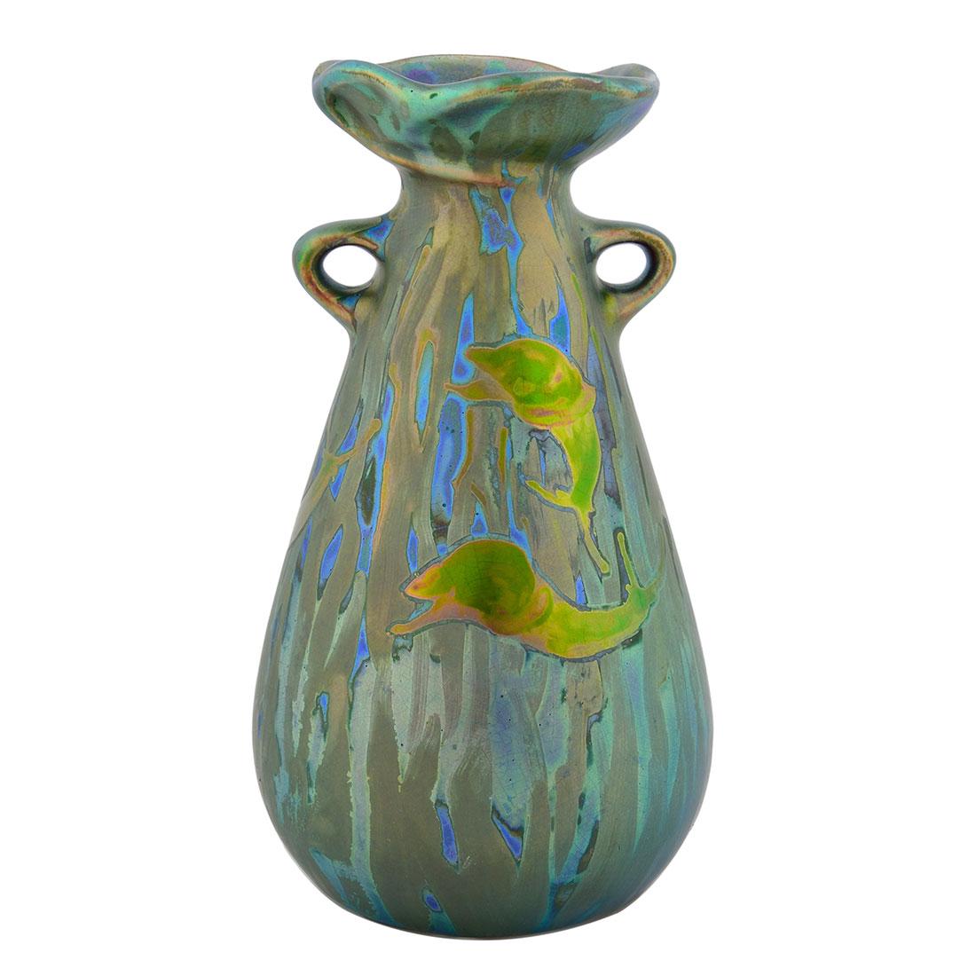 Weller Sicard vase, plants and snails, 7 1/8”: Weller twin handled Sicard vase with decoration consisting of plants on which are found four snails on opposite sides. Impressed Weller in small black letters and with shape number 48. Height 7 1/8 in