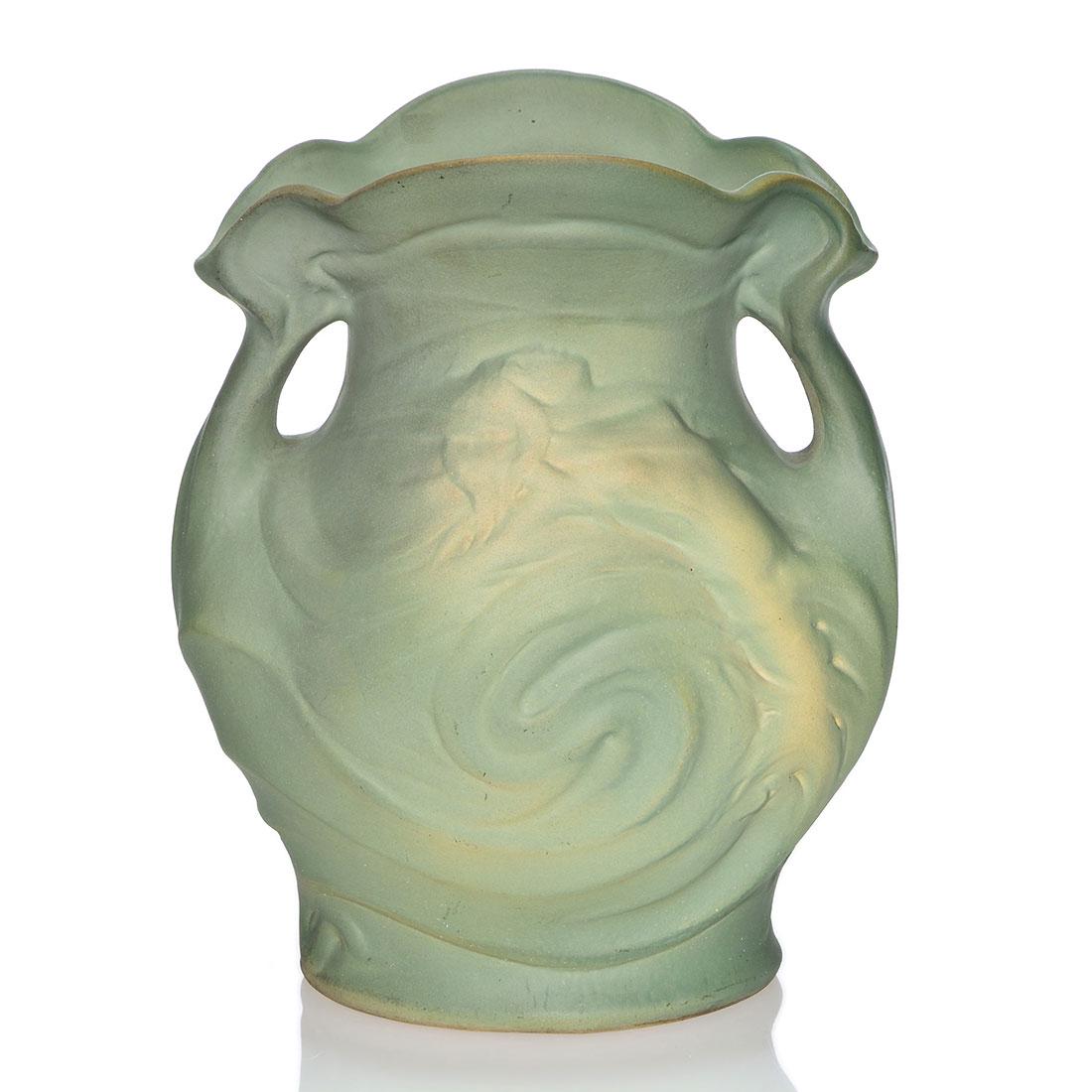Weller Matt Ware vase, Mermaid, giant fish, 8 3/4”: Weller Matt Ware twin handled vase with the image of a mermaid on one side and a very large fish on the other. Certainly related to the L’Art Nouveau line, the vase stands 8 3/4 inches tall and 