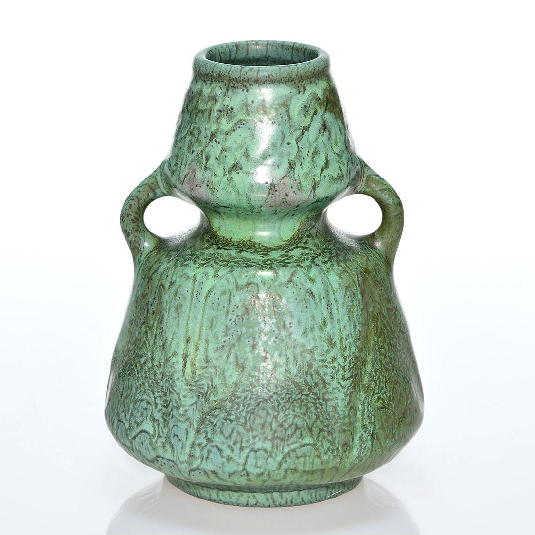 Weller Matt Ware vase, mottled green glaze, 4 5/8”: Weller Matt Ware (fru Russet) vase with molded floral design and covered with a nice mottled green matt glaze. Faintly impressed on the bottom with WELLER in block letters. There is faint overall craz