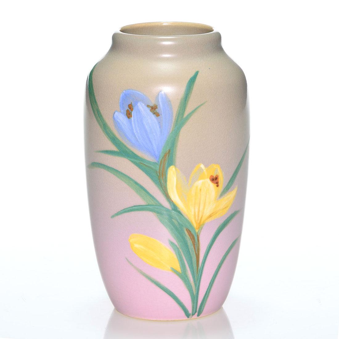 Weller Hudson floral vase, D England Laughead, 6”: Weller Hudson 6 inch vase decorated with crocus, the work of Dorothy England Laughead who added her initials in brown slip near the base. Incised Weller in script on the bottom. There is faint overall