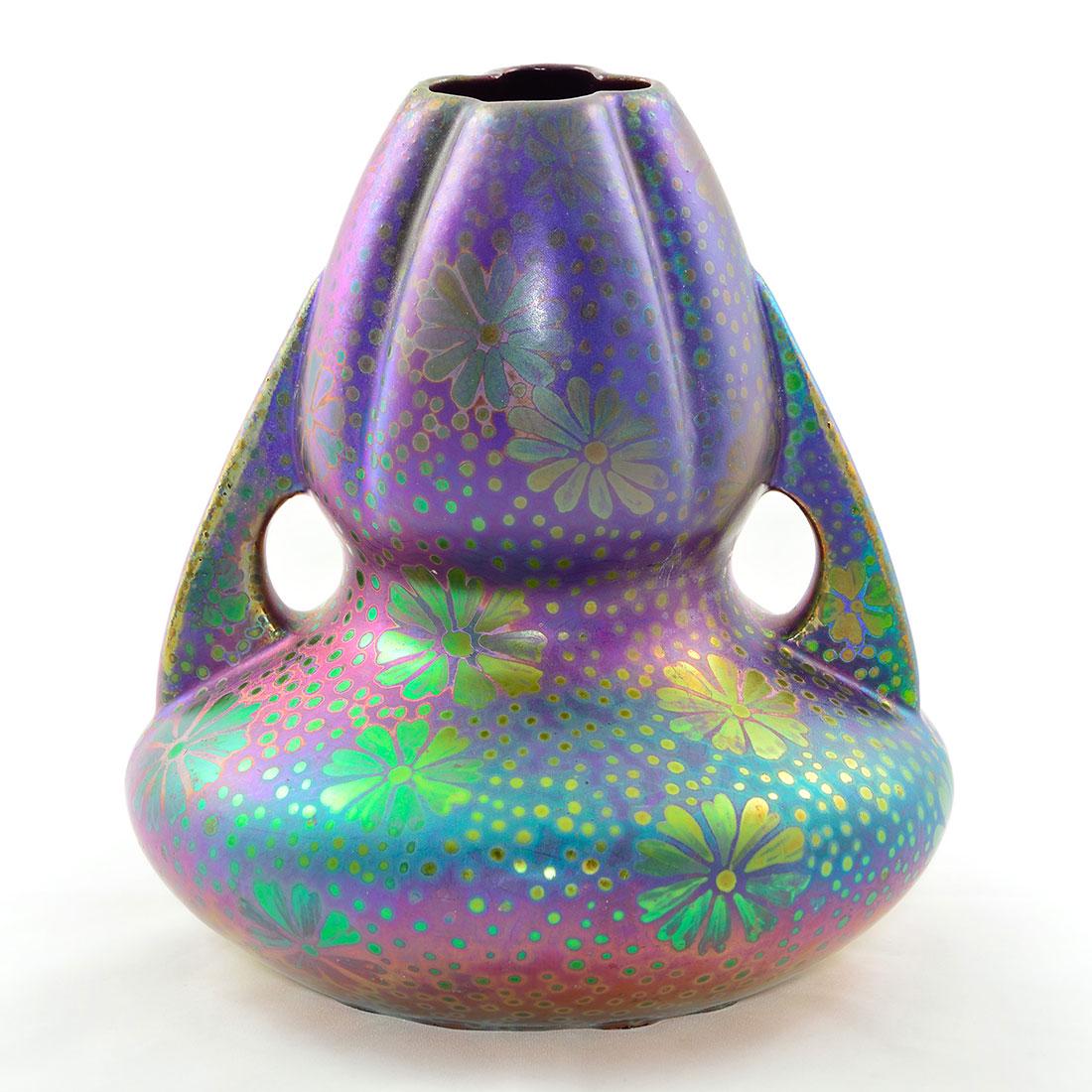 Weller Sicard vase, daisies, 7 1/2”: Weller twin handled Sicard vase with daisy decoration and very good color. Impressed Weller on the bottom and signed Weller Sicard on the side. Height 7 1/2 inches. There is restoration to a crack on 