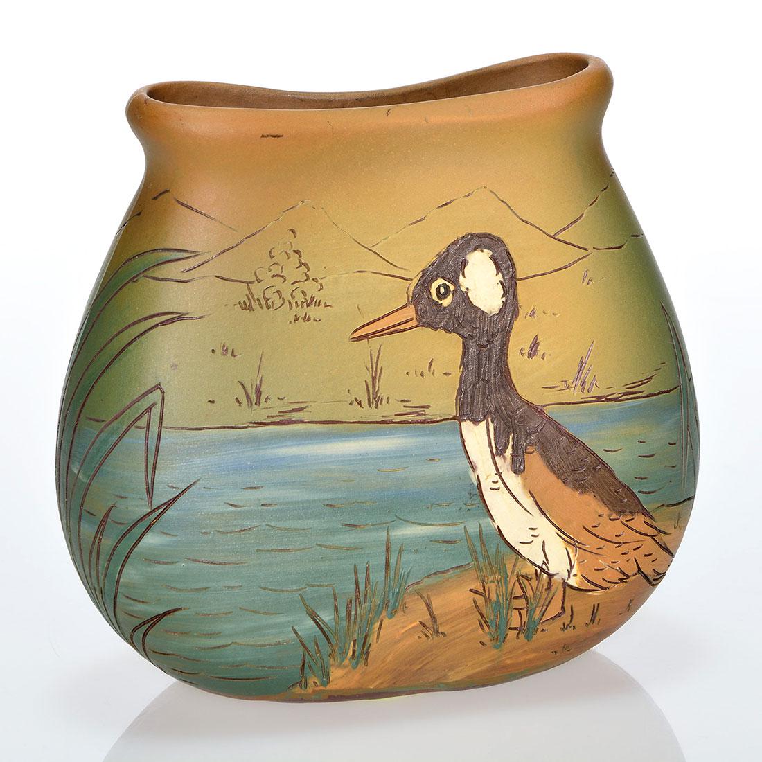 Weller Dickens Ware II vase, duck, 5 1/8”: Weller Second Line Dickens Ware vase decorated with a duck standing alongside a stream. Impressed Dickens Ware Weller and X 352. Excellent original condition. Height is 5 1/8 inches.
