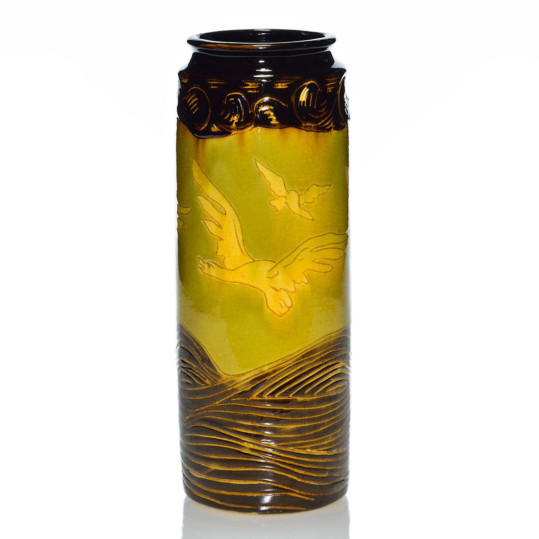 Weller Dickens Ware I vase, Geese, 10 1/2”: Weller First Line Dickens Ware vase with a flock of geese. Impressed Dickens Ware Weller, 605 and 5. There is fine overall crazing. Height is 10 1/2 inches. Bought in November, 2019 by a nonpaying bid
