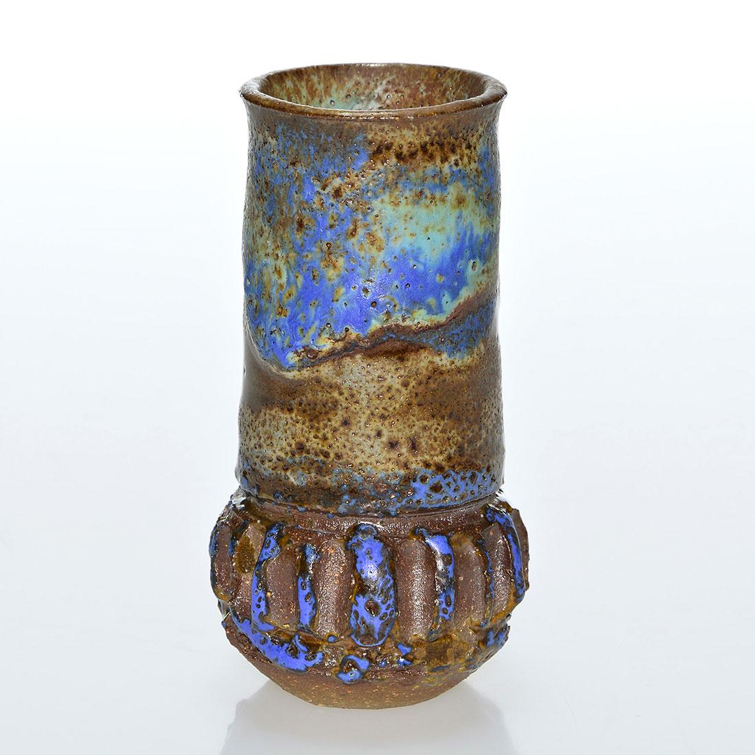 Rose Cabat early vase, volcanic glaze, 3 3/4”: Early Rose Cabat vase. Carved designs near the base with blue and bright green volcanic glaze. Marked Cabat on the bottom in dark slip. Height is 3 3/4 inches.