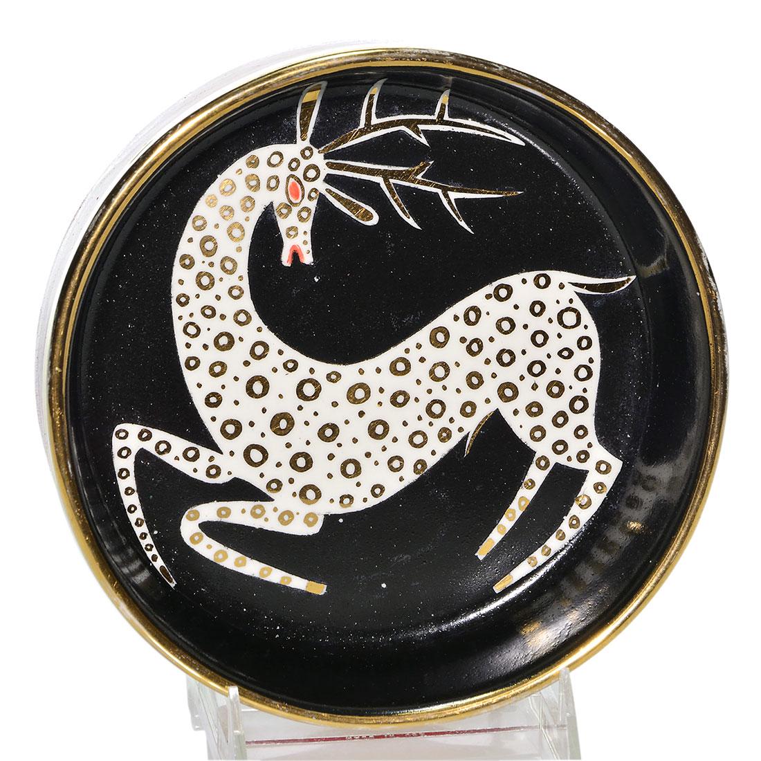 Waylande Gregory prancing buck bowl, 2 1/4 x 7 1/2: Waylande Gregory post Cowan bowl decorated with a prancing buck done in a combination of mat, high and luster glazes of red, white, gold and black. Signed Waylande Gregory on the bottom in gold. There