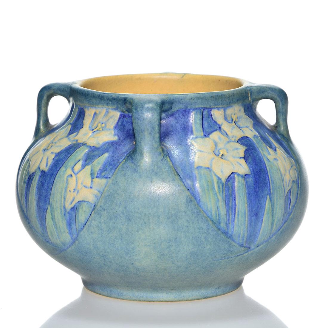 Newcomb College vase, jonquils, Simpson, 1921,3 7/8: Newcomb College vase with four handles and carved and painted jonquils done by Anna Frances Simpson in 1921. Marks include the Newcomb College logo, date code (LM81) for 1921, shape 274, the initials 