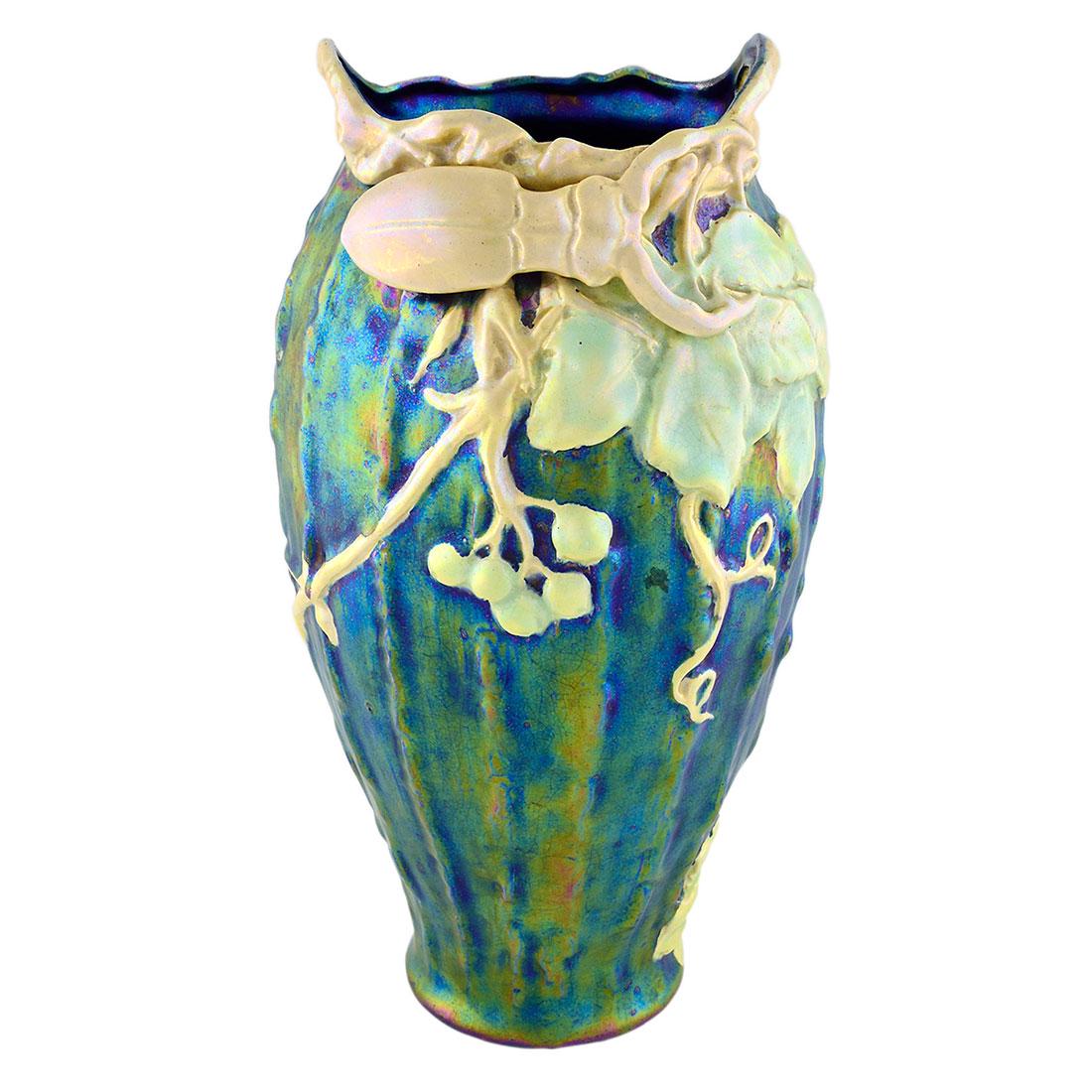 Austrian Heliosine luster vase, large scarab at rim,12: Large and impressive Austrian twin handled vase, most likely Heliosine, with amazing blue luster glaze over which is placed a pale green to cream luster glaze with grapes, leaves, stems and a very lar