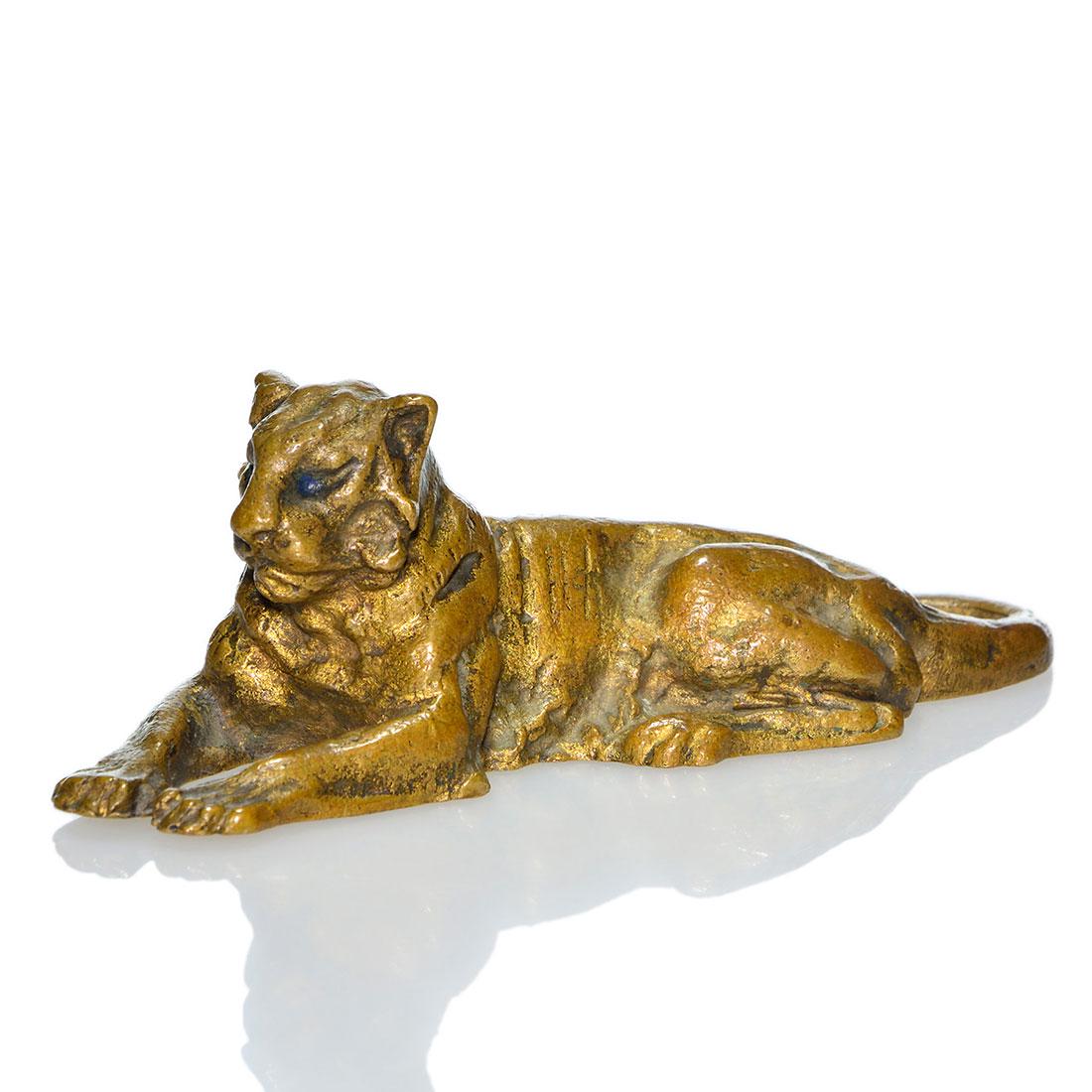 Tiffany Studios Tiger gilt bronze paperweight, 1 5/8: Tiffany Studios gilt bronze recumbent Tiger paperweight. Measures 1 5/8 inches by 5 inches in length. Impressed Tiffany Studios, New York, 932 and Belle Kinney, the designer. Excellent condition.