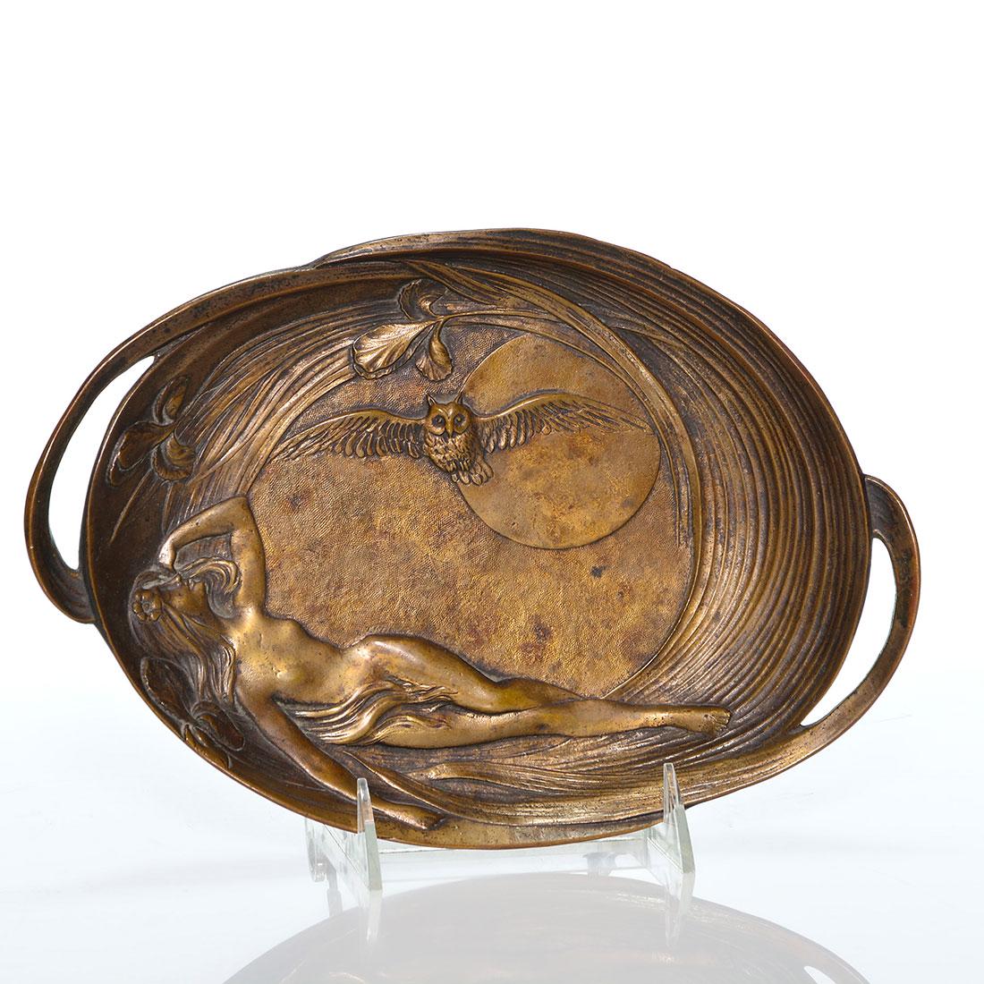 Tiffany Studios gilt bronze tray, Nude,Owl,Moon,10 1/2: Tiffany Studios gilt bronze handled tray depicted with a an owl in flight before a large full moon and a nude maiden resting among iris plants. Measures 1 3/4 inches by 10 1/2 inches by 7 1/4 inches w