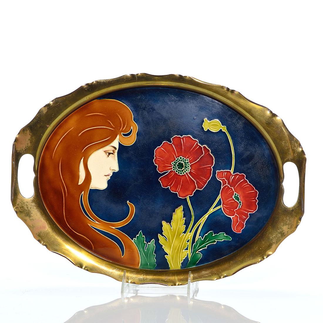 Von Schwarz tray, Luber, Woman, Poppies, 10x13 1/4: Johann Von Schwarz Norica tray consisting of an oval ceramic tile in a brass surround with handles. The tile portion features a beautiful woman looking at red poppies on a dark blue ground. Impressed 