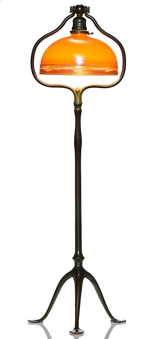 Tiffany floor lamp, 9 3/4” Steuben Intarsia: Tiffany Studios Arts & Crafts floor lamp accessorized with a Steuben golden brown Intarsia shade. The shade measures 9 3/4 inches across and features an iridescent gold border with a decorative motif.