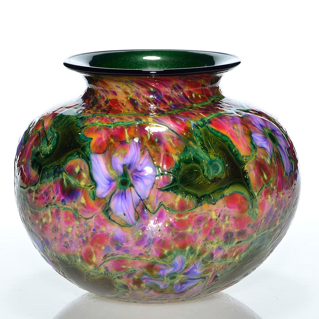 Large Charles Lotton Cypriot Aventurine vase, 7 7/8: Large Charles Lotton Cypriot Multi Flora vase with a green Aventurine cased interior finished by an ebony lip wrap. Purple pink clematis blossoms alternate with moss green foliage against a densely co