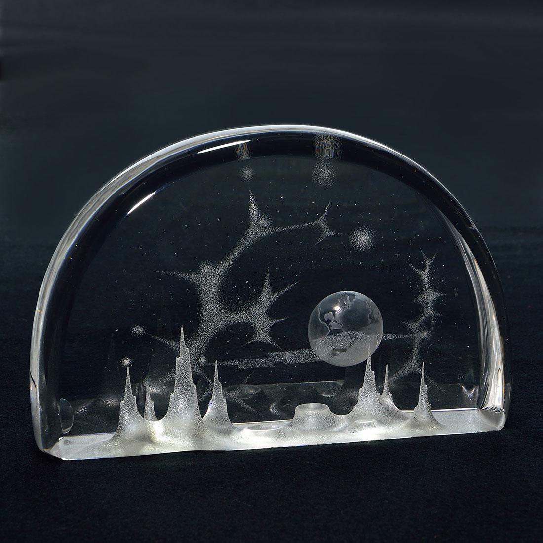 Steuben sculpture Mountains of the Moon: Rare Steuben sculpture entitled Mountains of the Moon, a design by George Thompson, circa 1960‚ reviewing earth from the lunar planet. Script engraved Steuben on the side. Measures 5 3/4 inches by 9