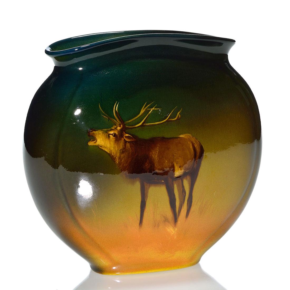 Rookwood Standard pillow vase,elk,Horsfall, 1895, 7: Standard glaze pillow vase decorated with an elk painted by Bruce Horsfall in 1895. Marks include the Rookwood logo, which indicates the date, shape 707 A and Mr. Horsfall’s incised monogram. Th