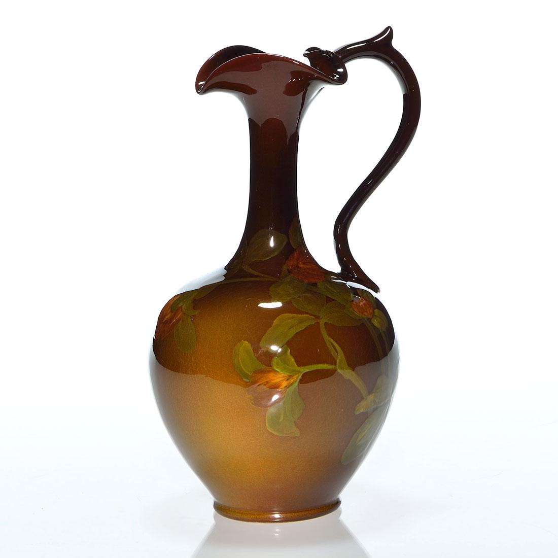 Rookwood Standard ewer, Hurley, 1901, 579 D, 9: Standard glaze ewer with clover decoration painted by E.T. Hurley in 1901. Marks include the Rookwood logo, date, shape 579 D and Mr. Hurley’s incised monogram. There is fine overall crazing. He