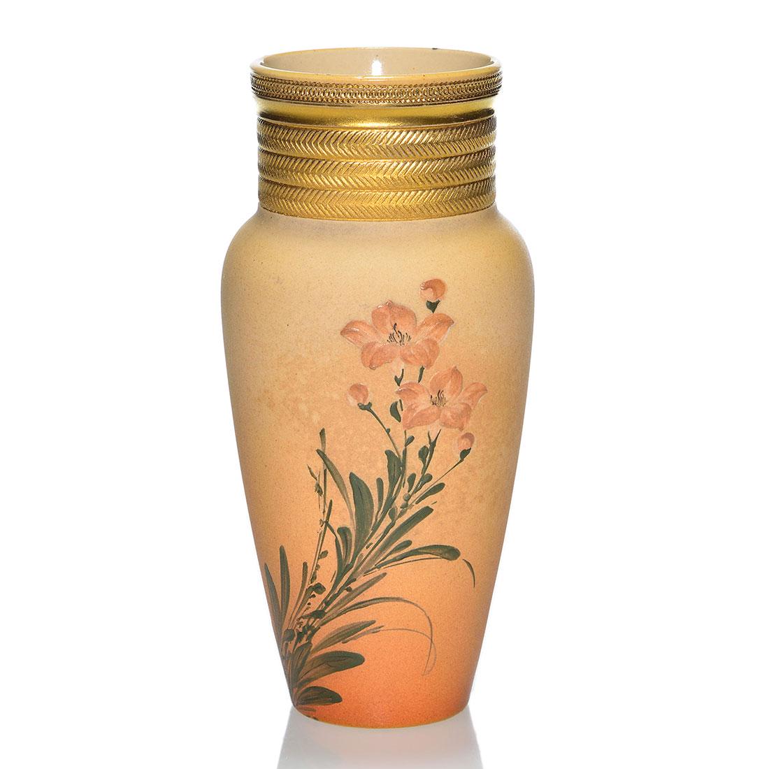Rookwood Dull Finish vase, floral, 1886, Daly, 7: Rookwood Dull Finish vase with orange day lily decoration on a mottled background done by Matthew Daly in 1887. Marks include the company logo, which indicates the date, shape number 324 C, W 3 for a 