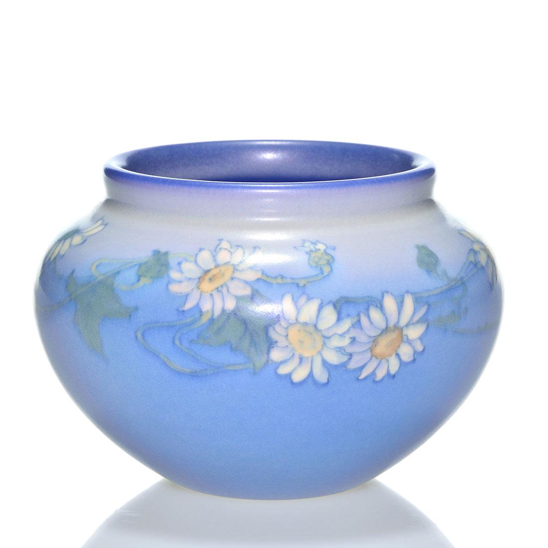 Rookwood Vellum floral, Rothenbusch, 1926,1110, 3: Vellum glaze vase decorated with daisies painted by Fred Rothenbusch in 1926. Marks include the Rookwood logo, date, shape 1110, an incised V for Vellum glaze and the artist’s incised monogram. 