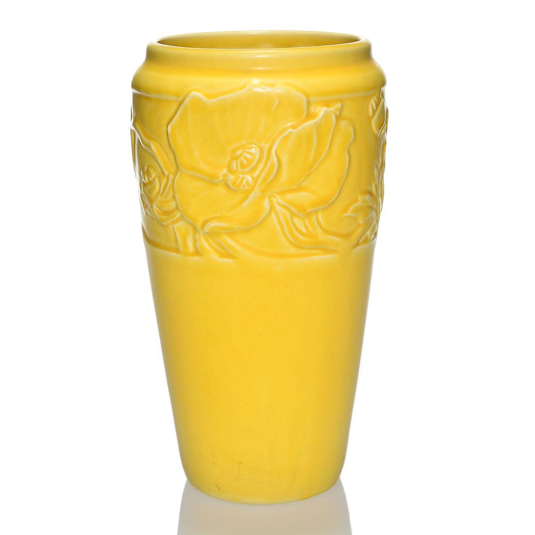 Rookwood production vase, yellow,1924, 1710, 10 3/4: Production vase with molded poppy decoration, cast in 1924 and covered with a yellow mat glaze. Marks include the Rookwood logo, date and shape 1710. Uncrazed with a couple of tiny, open glaze bubbles