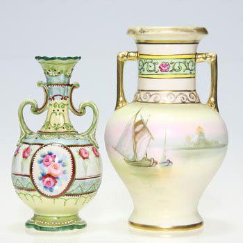 2 Nippon vases: roses, 6"; nautical scene, 7": Two Nippon hand painted vases: 1)Rose buds among decorative enamel accents. Height 6 inches. Unmarked. 2)Nautical scene with decorative neck and gold handles. Height 7 inches. Green wreath mark "Hand
