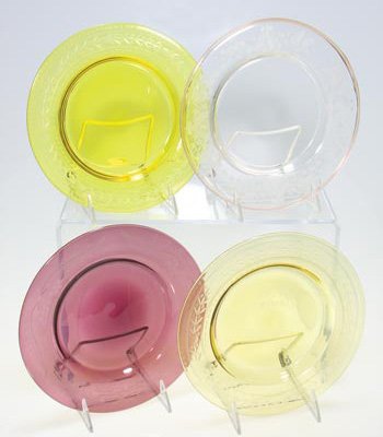 4 Steuben plates, etched borders, 8 1/2": Four Steuben plates, each having etched borders measuring 8 1/2 inches in diameter. 1) Two plates, Bristol Yellow and pale amber bear the engraved signature of "F. Carder" and the companies fleur-de-l