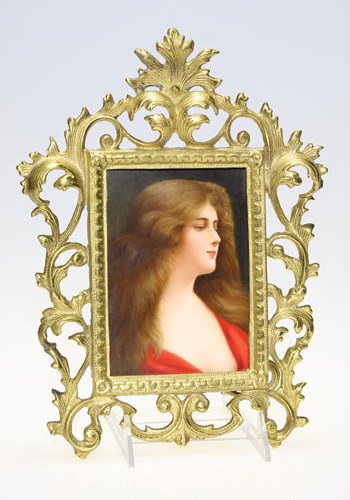 Berlin Porcelain 5 7/8" X 4 1/8" plaque, young wom: Berlin Porcelain 5 7/8 inch by 4 1/8 inch plaque decorated with the portrait of a pretty young woman with long hair in a red gown by Wagner. Signed by the artist in the lower left hand corner and mark