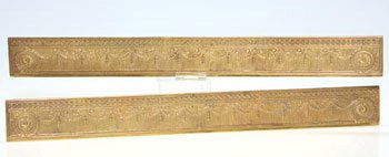 Pr Tiffany bronze dore blotter ends, 19 1/4": Good pair of Tiffany bronze desk blotter ends represented with the Adams pattern beneath a nice dore finish. The set are impressed "Tiffany Studios, New York, 1775" and measure 9 1/4 inches in length.