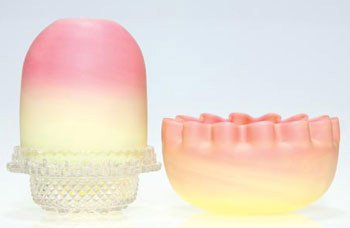 Webb Queen's Burmese Fairy lamp, 6 3/8": Thomas Webb Queen's Burmese fairy lamp. A Burmese base with pie crust edge supports the 3 1/2 inch dome and clear pressed Clarke's insert. The base is stamped "Thos Webb & Sons, Queen's Burmese Ware,