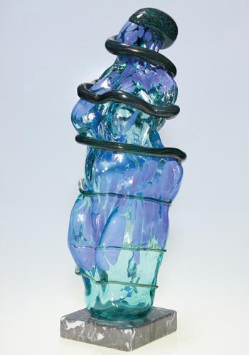 Susan Gott female & serpent sculpture, 20 1/2": Susan Gott sculpture modeled as a female torso, a writhing serpent coiling the form. The soda green figure dappled with sky blue, most likely based on an ancient fertility goddess, the snake a variega