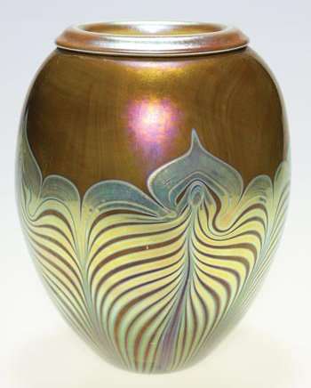 Carl Radke vase, Phoenix Studios, 7 3/4": Good Carl Radke vase imitating Old Master style workmanship showing feathers pulled in bright gold against a bronze-like backdrop. The rim is tightly rolled and repeats the gold color. Height 7 3/4 in