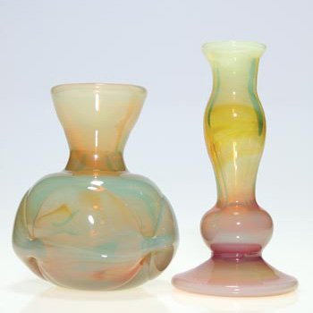 2 Labino opal ruby vases: 5" '70; 6 1/4" '82: Labino "Abbot and Costello" vases in yellow opal and mottled with ruby. The first is Abbot a slender 6 1/4 inch that could be converted for use as a candlestick. Height 6 1/4 inches with 2-1982 date. 