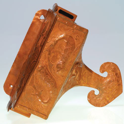 A&C copper wall mount tobacco holder,mermaid/fish, 12 3: Good Arts and Crafts copper wall mount receptacle for tobacco with holders straddling to contain a match box and struck matches. The container has a wonderful hand wrought deep sea design in repousse 