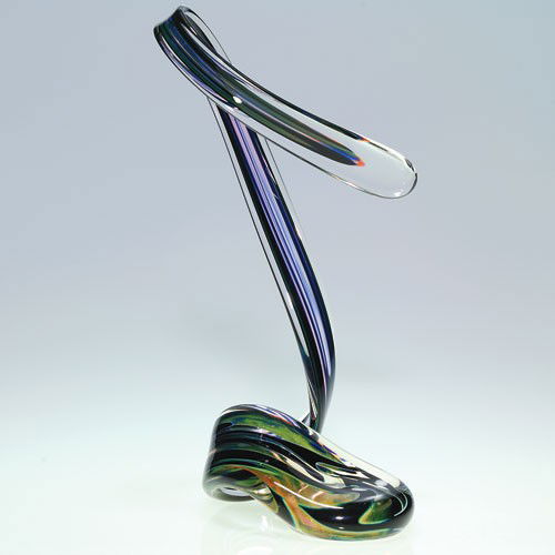 John Lotton sculpture, color inclusions, 10 1/2, signed: Sensual John Lotton sculpture with inclusions of ebony, violet, blue, olive green and a touch of apricot within the ribbon-like glass. Height 10 1/2 inches. Engraved by the artist above the 1984 date.