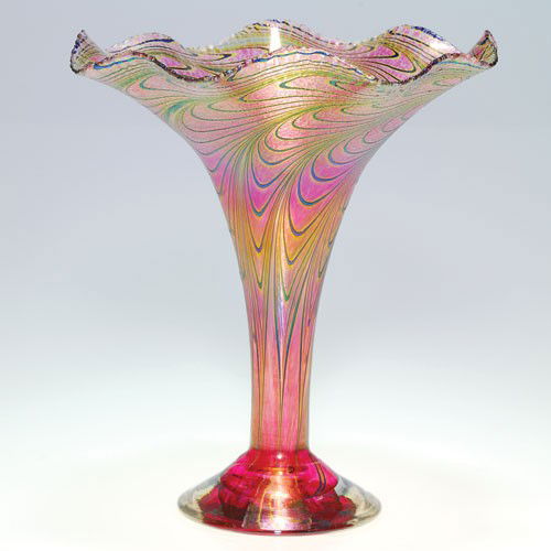Robert Held flaring vase, peacock pattern, 10 1/2", sig: Robert Held vase with dark cobalt plumes fused into a pretty mottled pink, the edge of the rim finished with a nice stretched textured pattern. Height 10 1/2 inches. Engraved "R. Held Art Glass" below