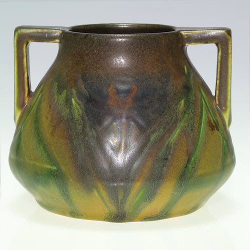 Rookwood 3 3/4" Carved Mat, Lincoln, peacock feathers.: Carved Mat 3 3/4 inch vase featuring carved and painted peacock feathers front and back, the work of Elizabeth Lincoln in 1920. Impressed with the Rookwood logo, the date and shape 2082 and incised wi