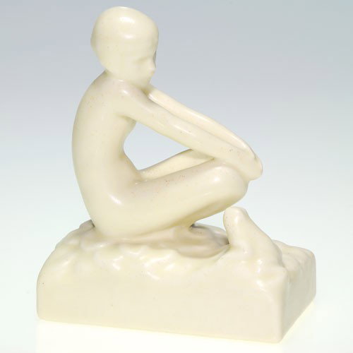 Rookwood girl and frog 4 5/8" figure, #6521, Ivory Mat: Figure of a nude girl and a frog seated atop some aquatic vegetation, a Louise Abel design, cast in 1936. Impressed with the Rookwood logo, the date and shape 6521. Uncrazed with some very mild pepper