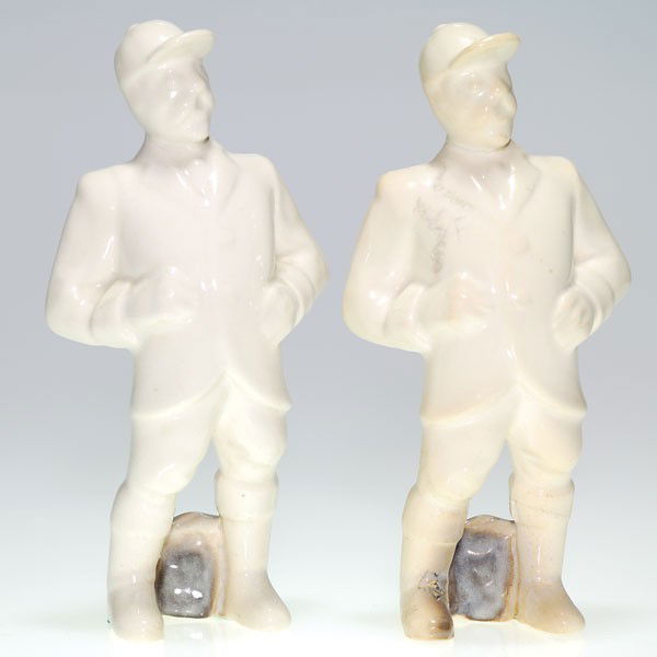 2 Cowan "Hunter" 8" figurines, Shadow White glaze: Cowan lot of two "Hunter" figures, both covered with the Shadow White glaze. Each is marked Cowan in block letters on the sole of a foot and each has fine, light crazing. Height 8 inches. One of the f