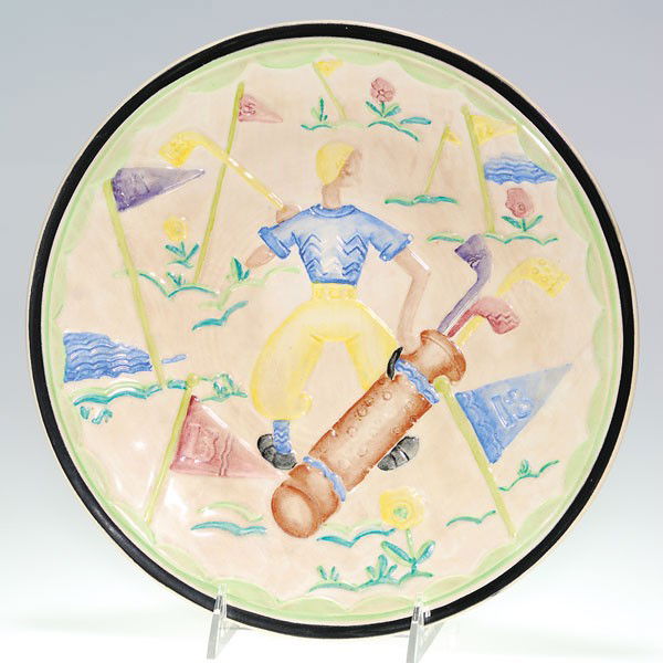 Cowan Sports plate, "Golf", Schreckengost design,: Cowan charger with a person participating in the sport of golf, a Viktor Schreckengost design. Measuring 11 1/4 inches in diameter the plaque is impressed with the companies block lettering and the ci