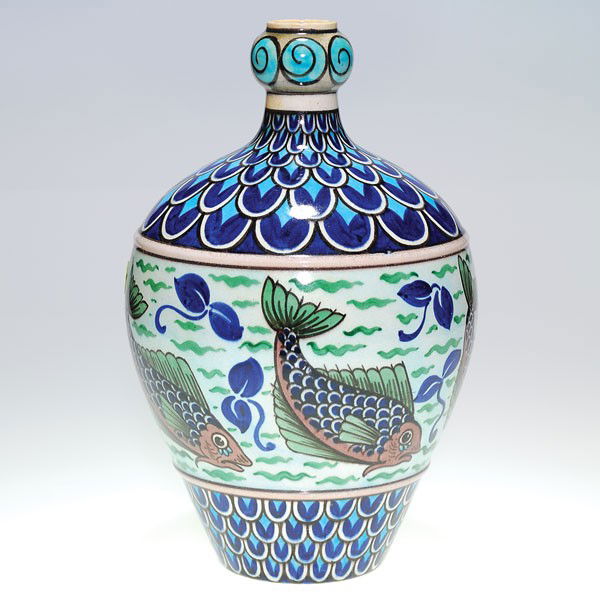 Burmantofts gourd shaped vase, fish: Handsome Burmantofts Faience vase of Persian influence, having a repeating design of fish and floral decoration done by V. Kremer. Impressed "Burmantofts Faience 11" and signed in black slip with Krem