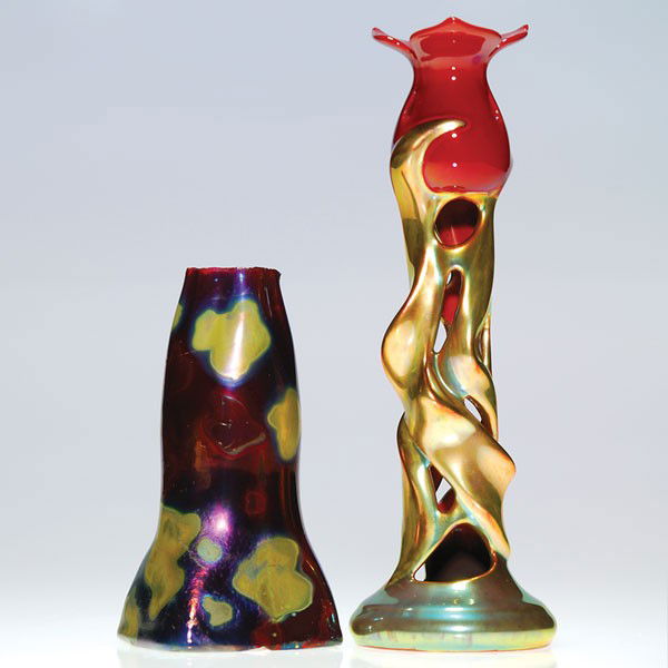 Zsolnay candleholder, 7 3/4", Massier vase, 4 3/4": Two luster items. 1. Art Nouveau Zsolnay flower form candleholder in Eosine glaze. Height 7 3/4 inches. Marked with recent Zsolnay ink stamp logo. 2. Clement Massier vase with small abstract shapes on