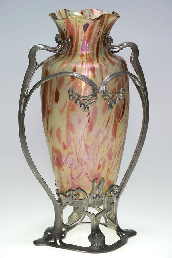 Loetz vase, Art Nouveau pewter mount, 14 1/2": Noble Loetz vase caressed within a stylish Art Nouveau pewter mount. The 12 inch vase, a vari color of purple, brown and tan mingle within frosty glass. The pewter mount cast with berry clusters on sw