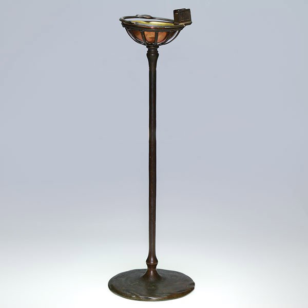 Tiffany Studios smoking stand, leaf pod base, 28, : Tiffany Studios bronze smoking stand with a match box holder attached to the hinged rim and accompanied with a copper brass bowl. Height 28 inches. The circular leaf pod base is impressed "Tiffany Stu