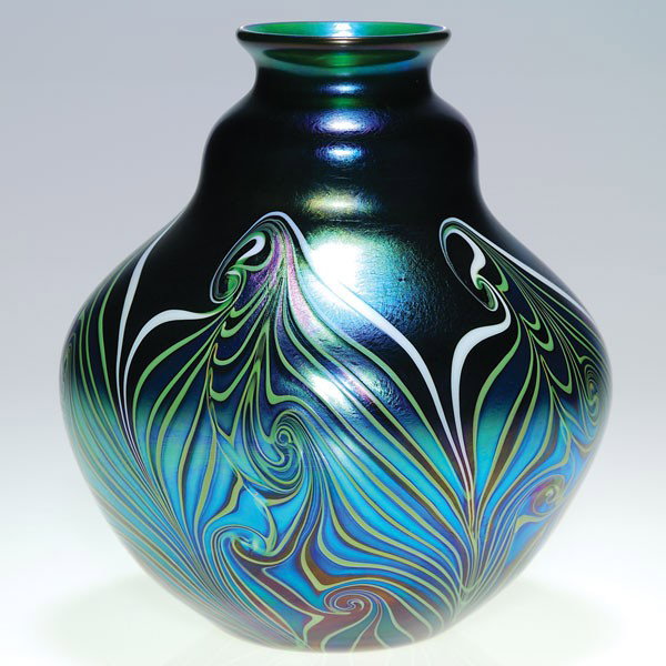 Orient & Flume gourd vase, blue silver, 7 3/4": Orient & Flume gourd vase prominently displaying wide curling leaves in purple and white over a blue green body. Height 7 3/4 inches. Incised with the company name, the 1984 date and AT5 on the bottom