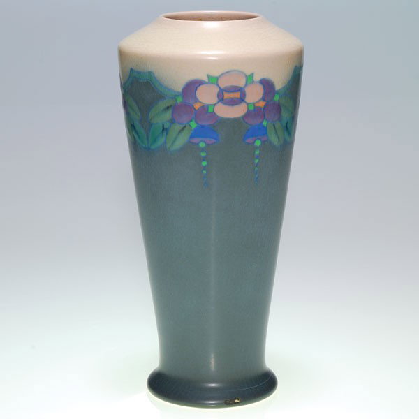 Rookwood Vellum 11 1/2" floral, C.S. Todd, 1918: Vellum Glaze 11 1/2 inch vase encircled by a band of colorful, Art Deco style flowers by C. S. Todd in 1918. Impressed with the Rookwood symbol, the date and shape 1663 C and incised with the artist's