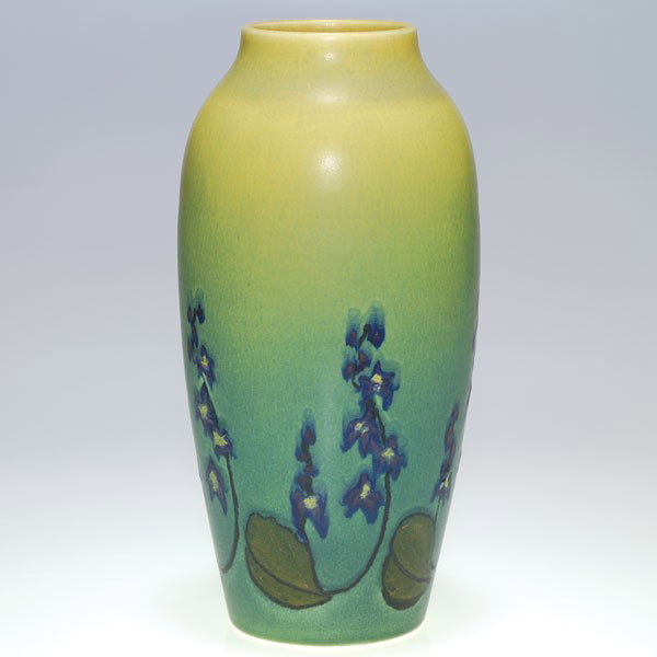 Rookwood 11" mat floral, Todd, 1920: Mat glaze 11 inch vase with incised and painted delphinia vines, the work of Charles Todd in 1919. Impressed with the Rookwood symbol, the date, shape 977 and a V for Vellum and incised with Mr. Todd'