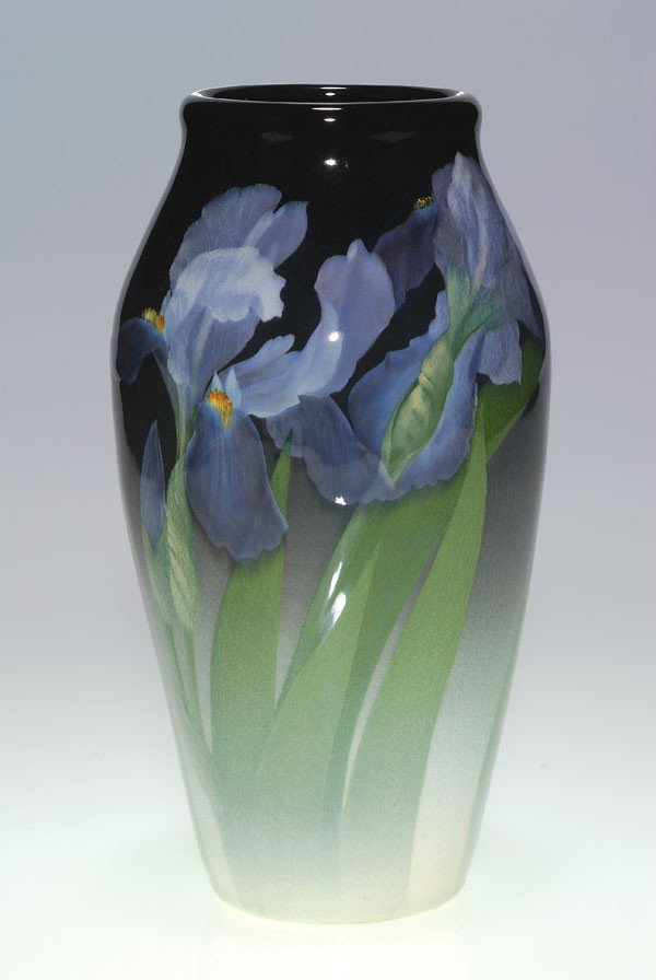 Rookwood Iris vase, irises, Schmidt, 1904, 9 1/4": Showy Iris Glaze vase decorated with two finely detailed large blue bearded irises in full bloom, the work of Carl Schmidt in 1904. The black background color at the top of the vessel contrasts nicely